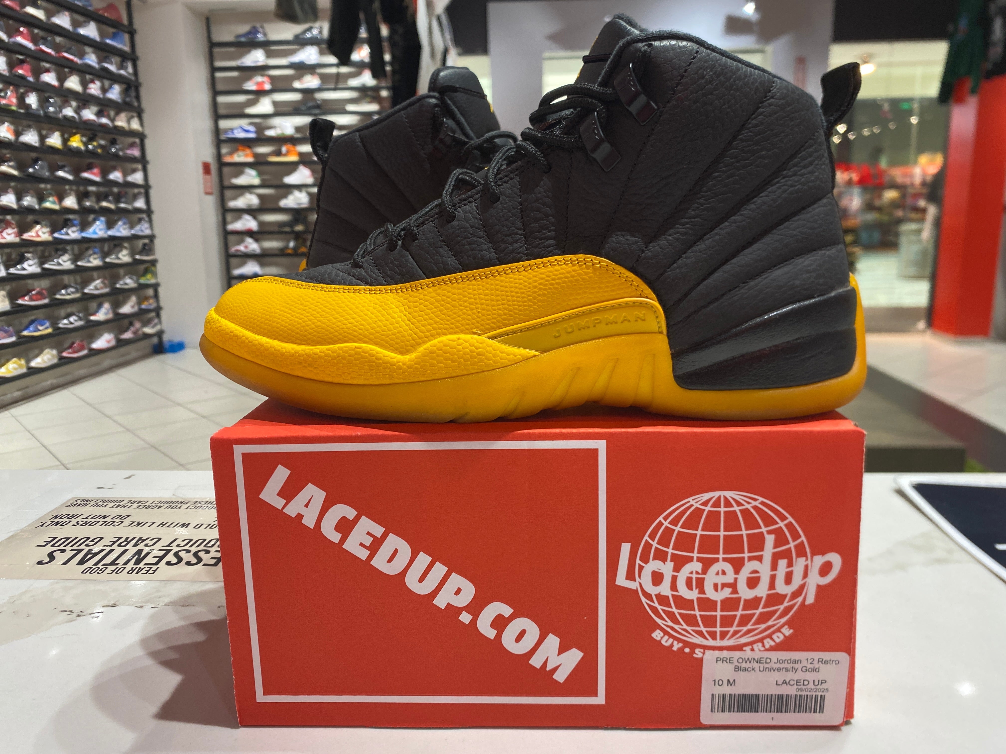 PRE OWNED Jordan 12 Retro Black University Gold