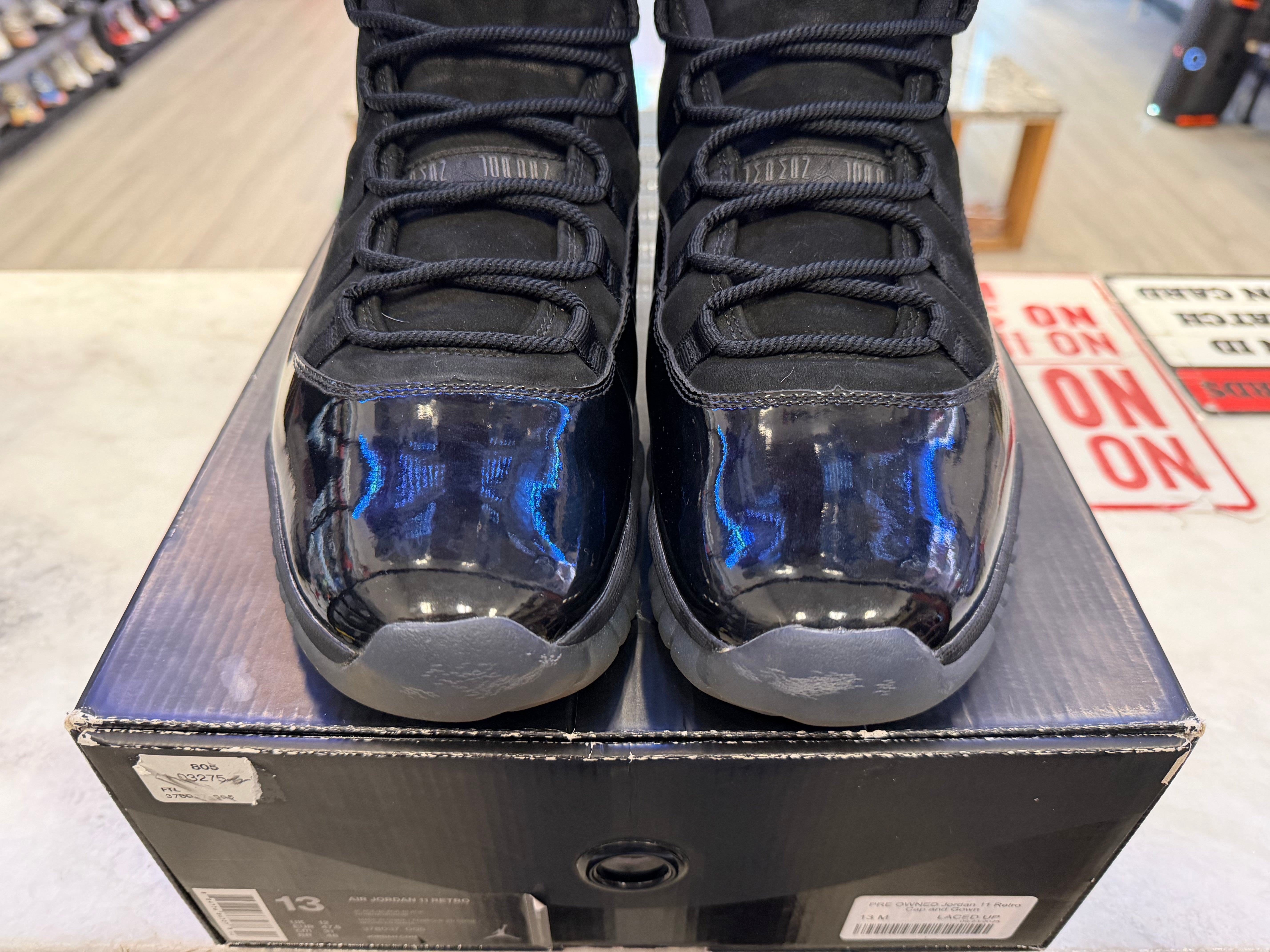 PRE OWNED Jordan 11 Retro Cap and Gown