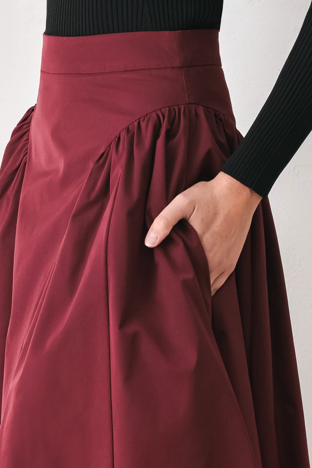 SCULPTED NOIR SHIRRED MIDI SKIRT