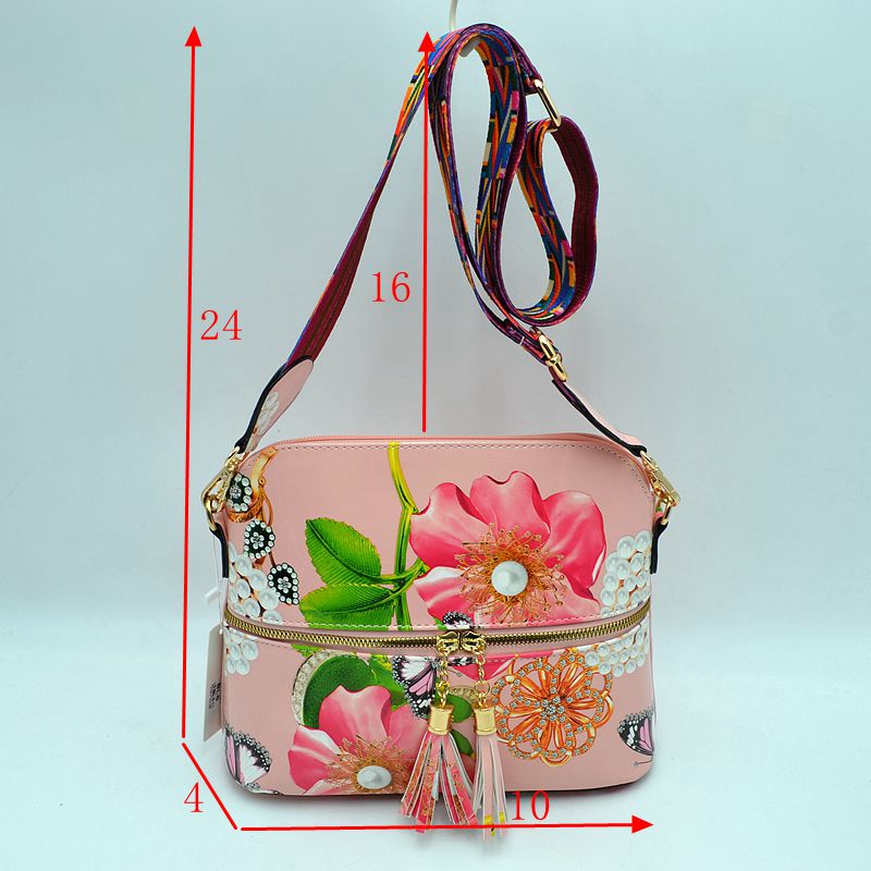 Ostrich-Embossed Dome Crossbody Bag with Dual Tassel Zippers