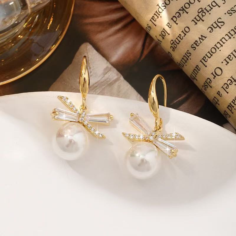 Women's Bow High-grade Light Luxury Temperament Imitation Pearl Ear Hooks Earrings