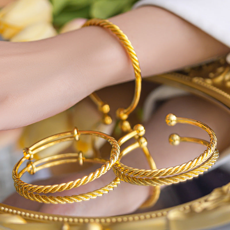 Polished Surface Twist Push-pull Alluvial Gold Bracelet