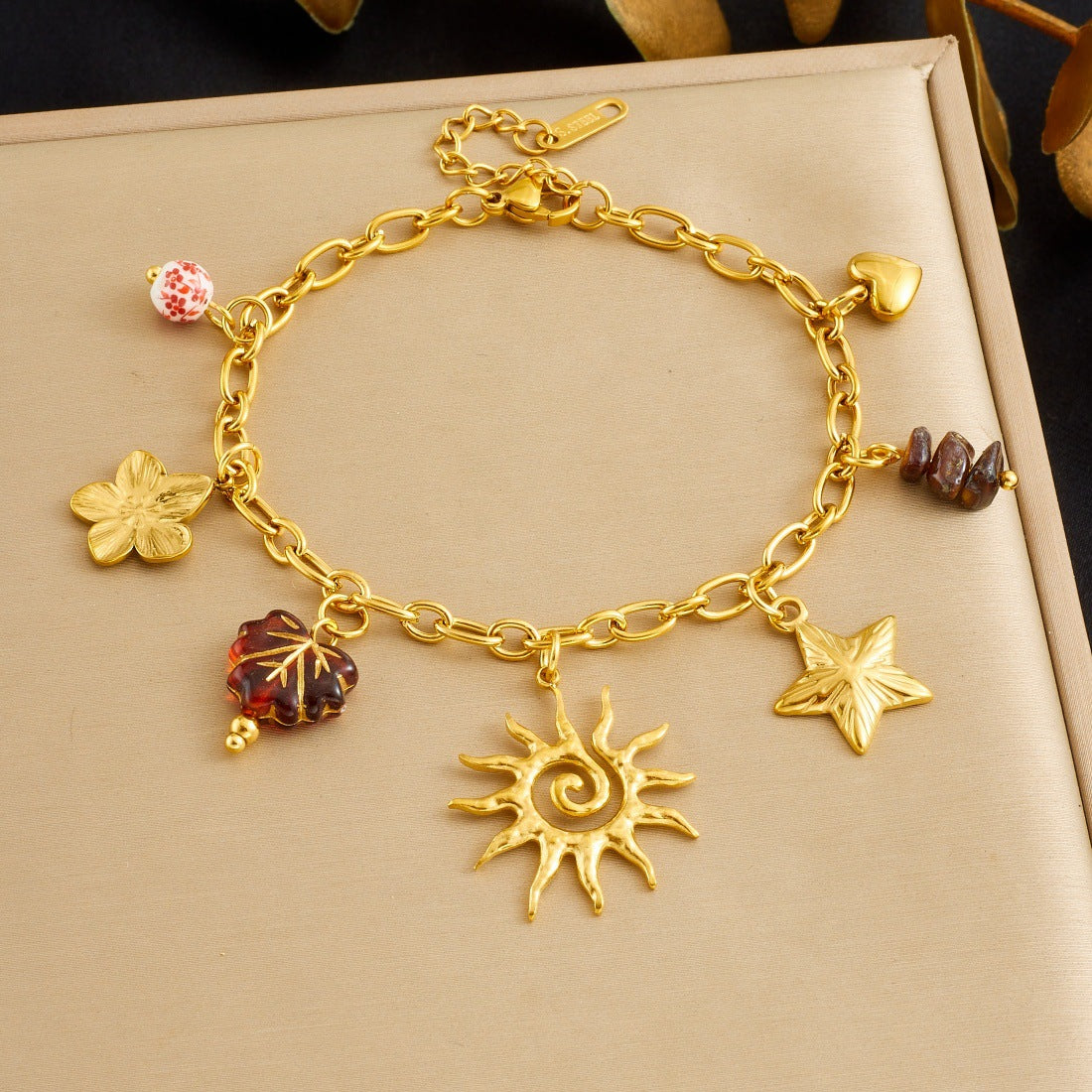 Fashion Gold-plated Star Sunflower Gravel Beaded Leaf Stainless Jewelry Set