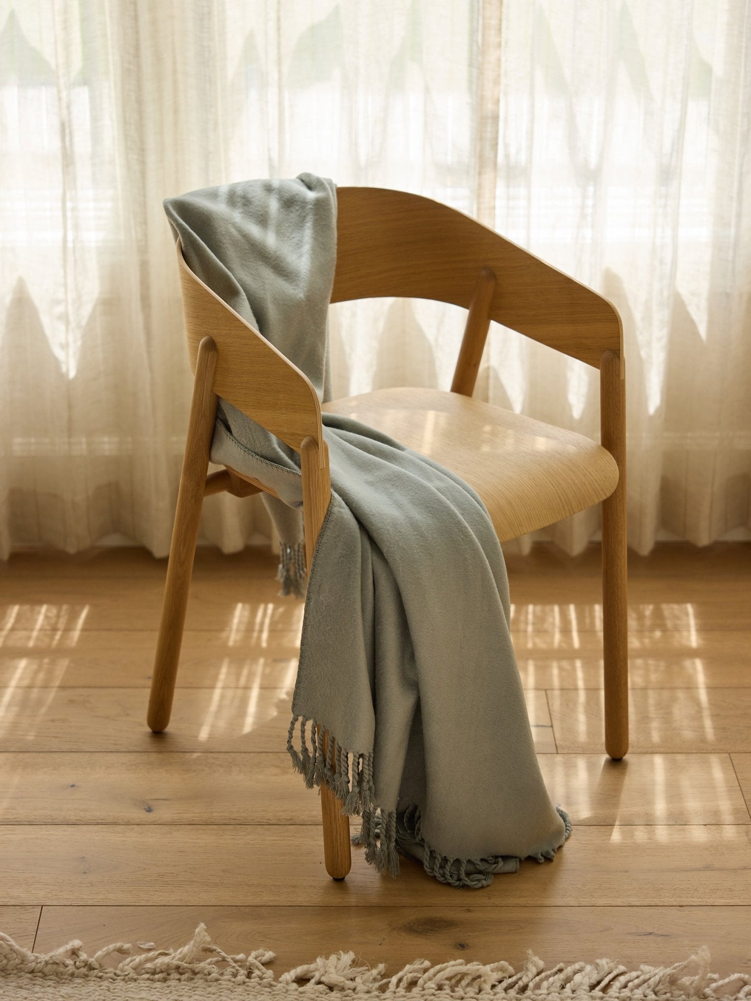 Bamboo Tassel Throw by Cozy Earth at Shirley Shoppe