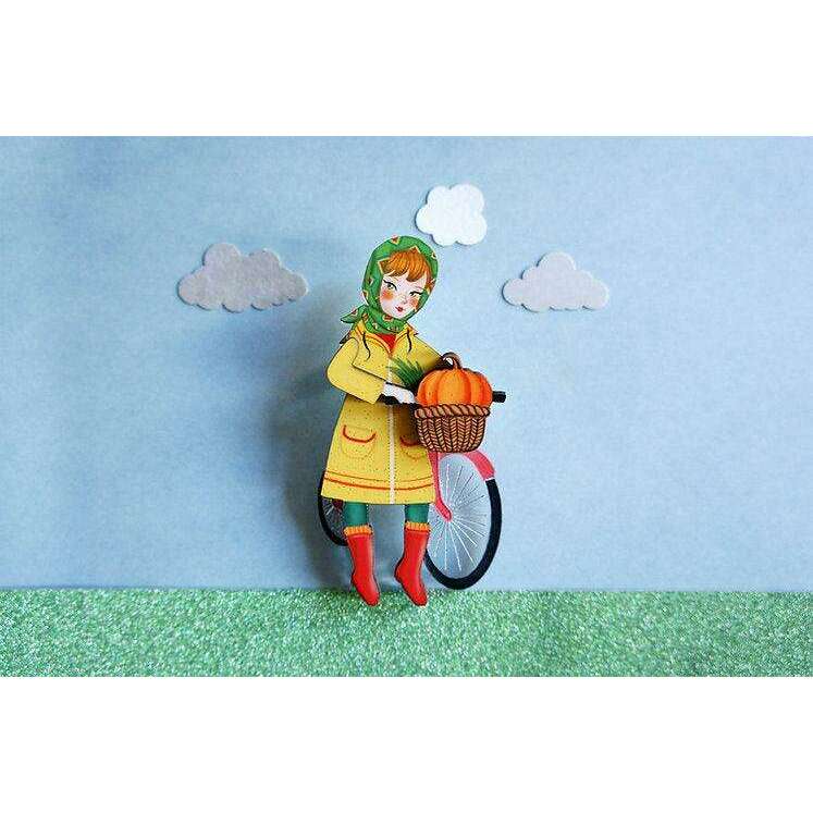 Girl with bicycle brooch by Laliblue