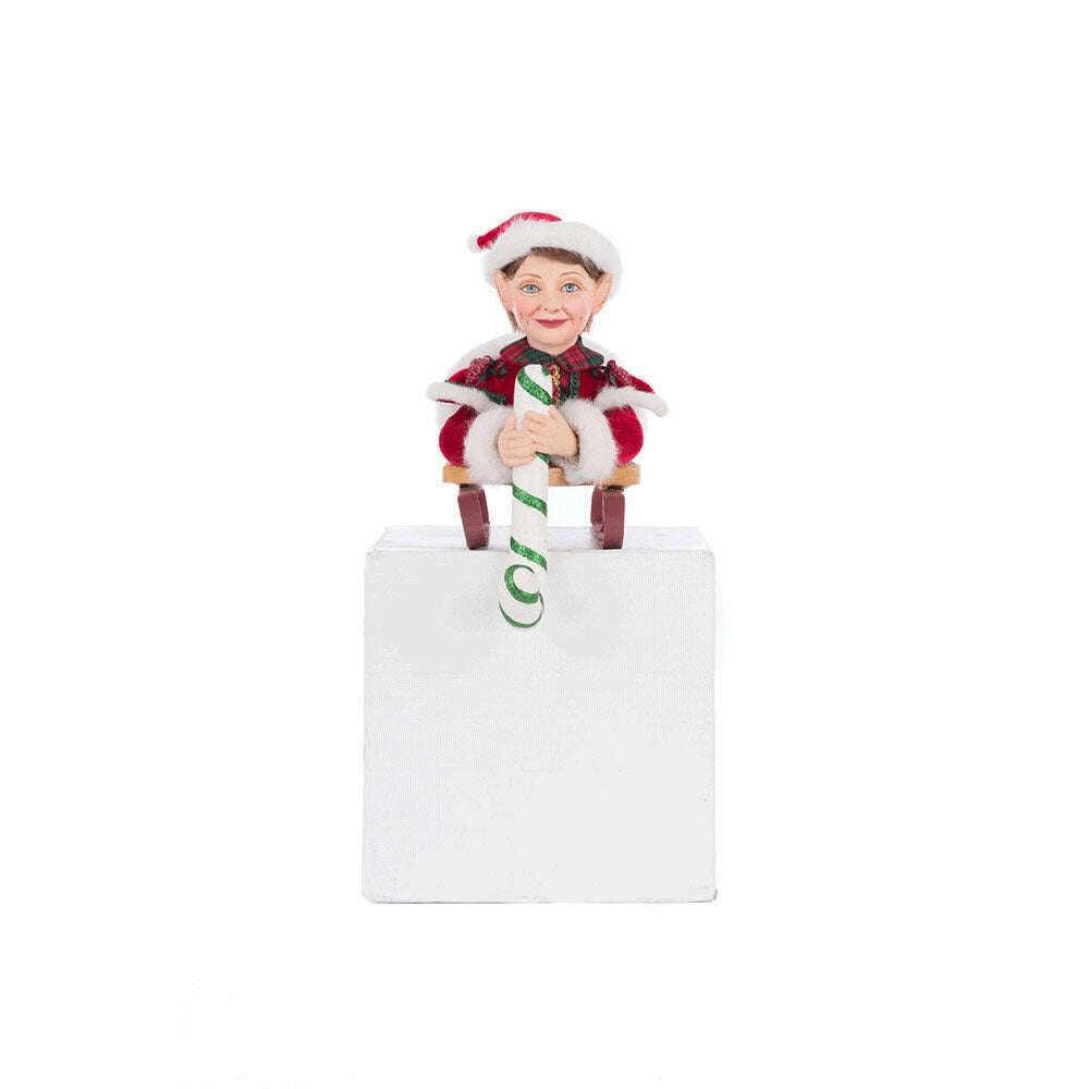 Laying Elf on Sled Stocking Holder by Katherine's Collection