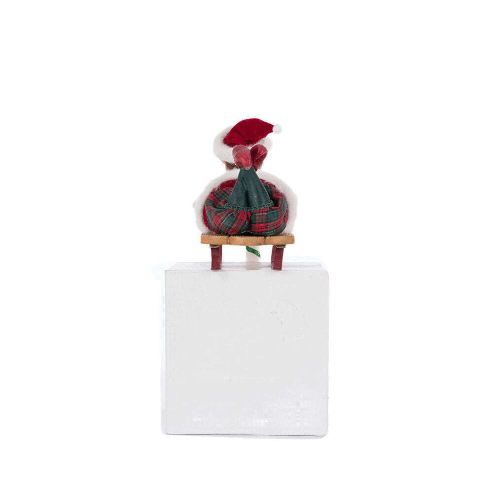 Laying Elf on Sled Stocking Holder by Katherine's Collection