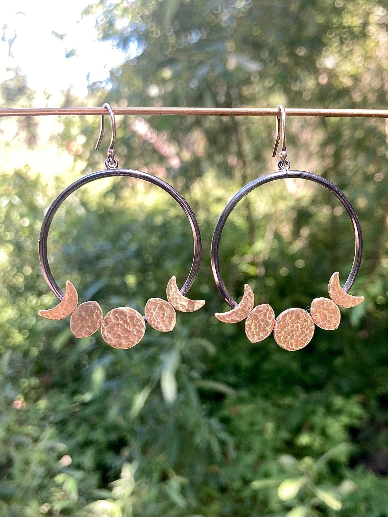 Moon Phase Hoop Earrings in Oxidized Sterling Silver and Brass by Alison Morse at Shirley Shoppe