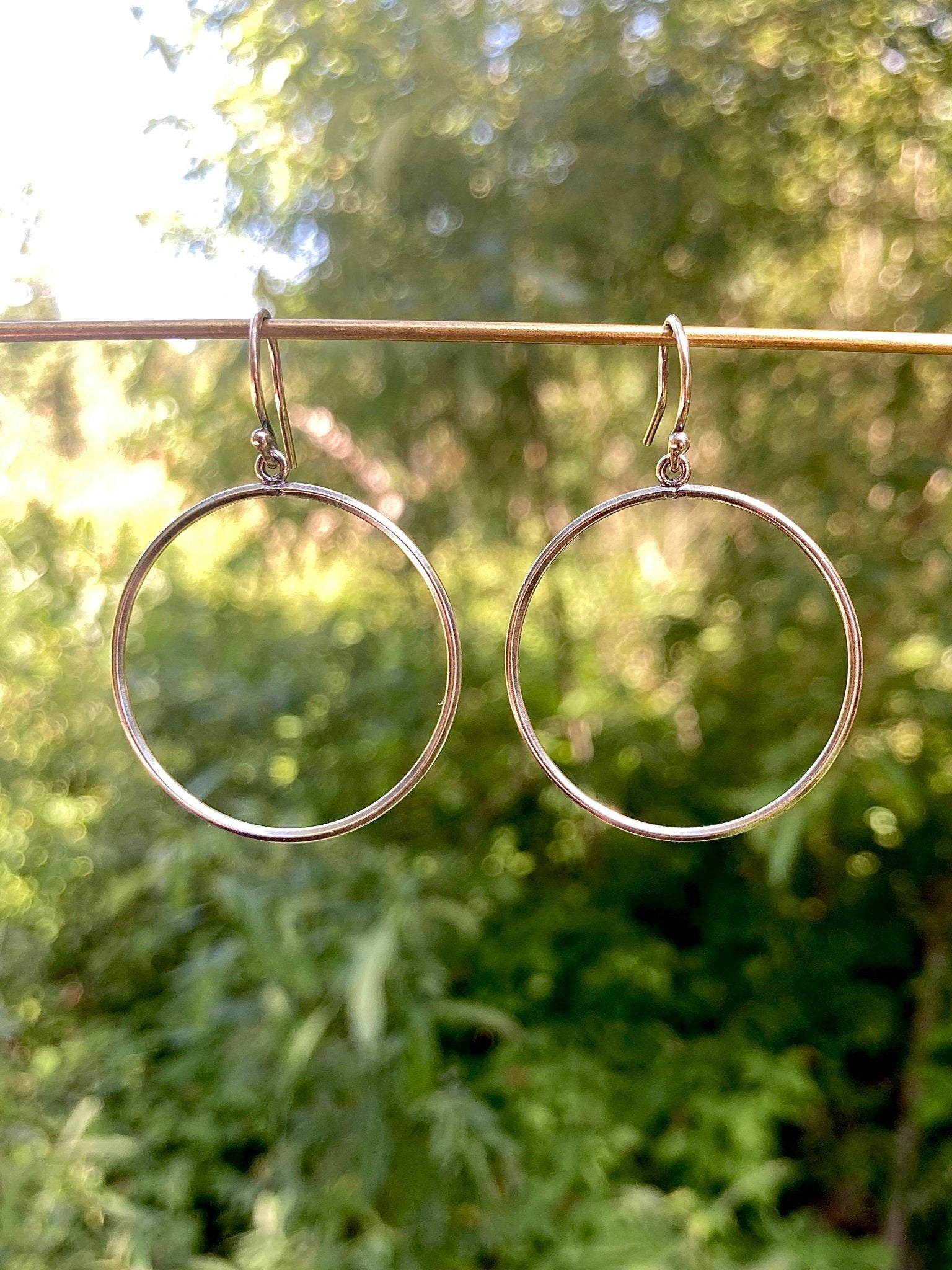 New Moon Hoop Earrings in Sterling Silver | Moon Phase Earrings by Alison Morse at Shirley Shoppe