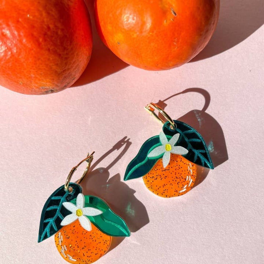 Orange Dangle Acrylic Earrings by Quirks! at Shirley Shoppe