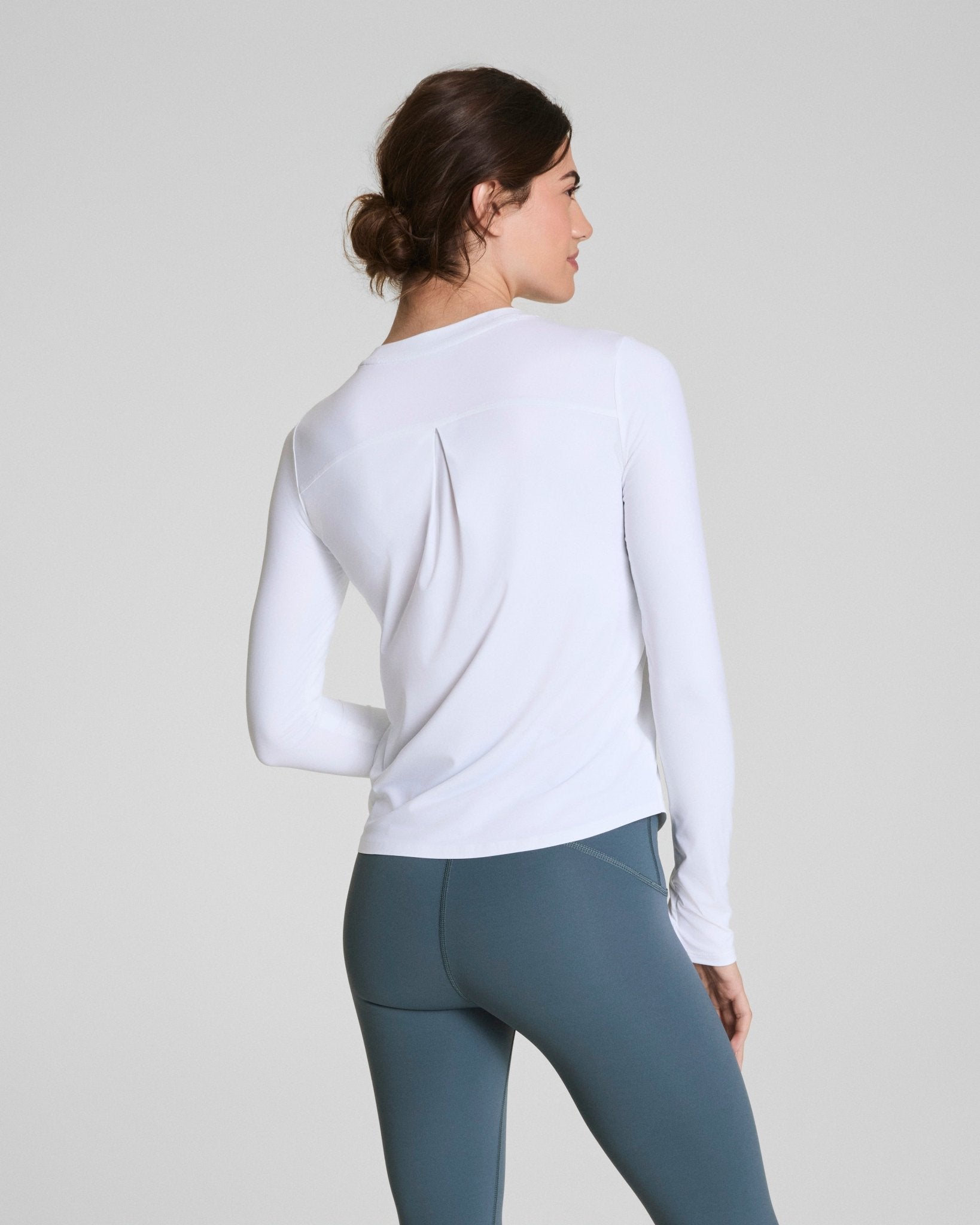 SPANX® Activate Long Sleeve Top | Vivid White by Spanx at Shirley Shoppe