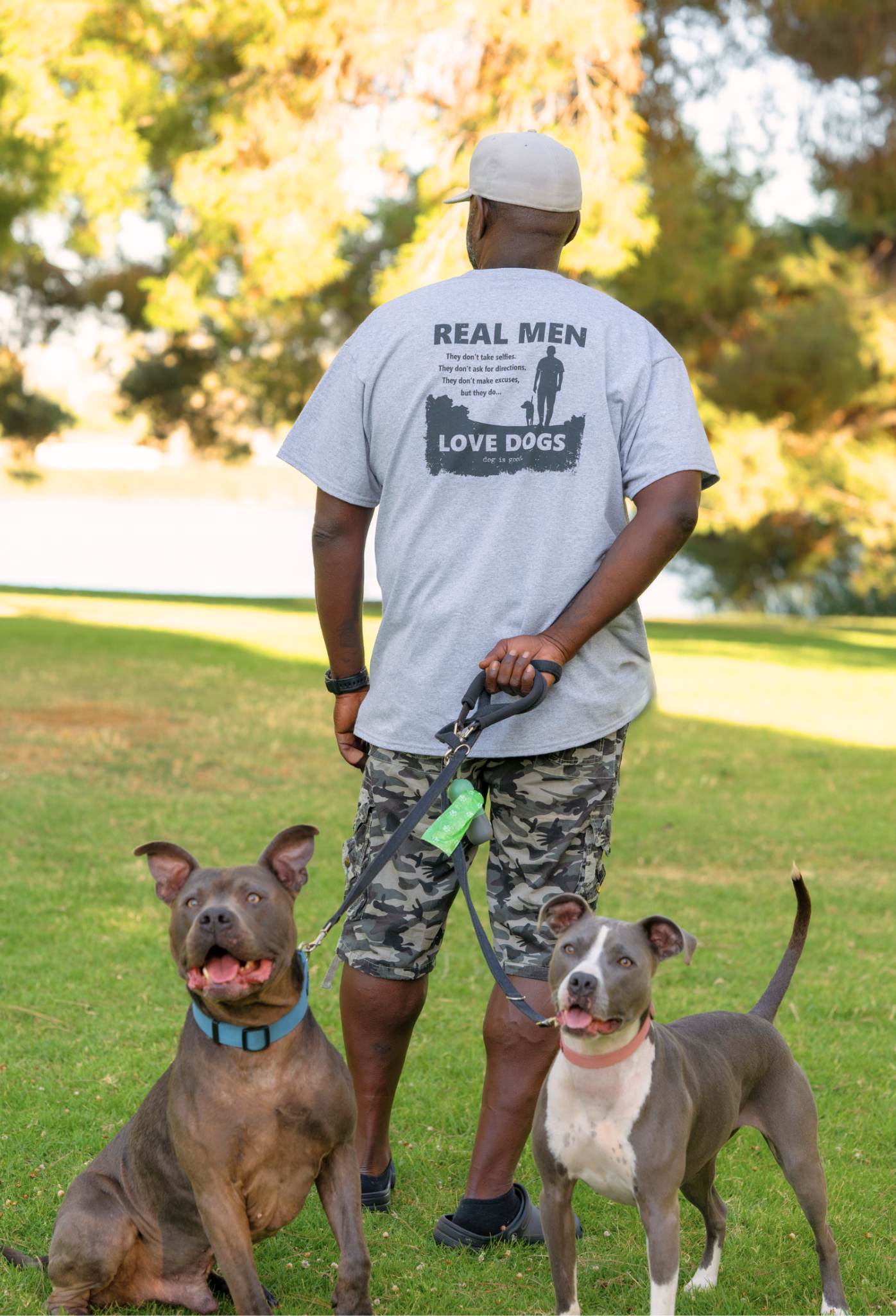 T-shirt: Real Men Love Dogs by Dog is Good at Shirley Shoppe
