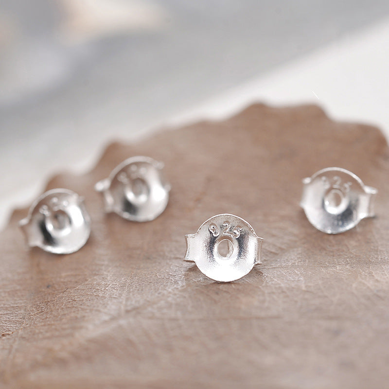 Plastic Ear Plug Pair Of White Stud Earrings
