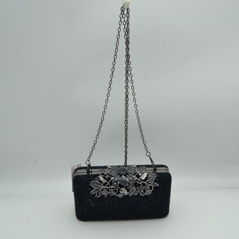 Studded Evening Clutch with Ornate Leaf Clasp Detail