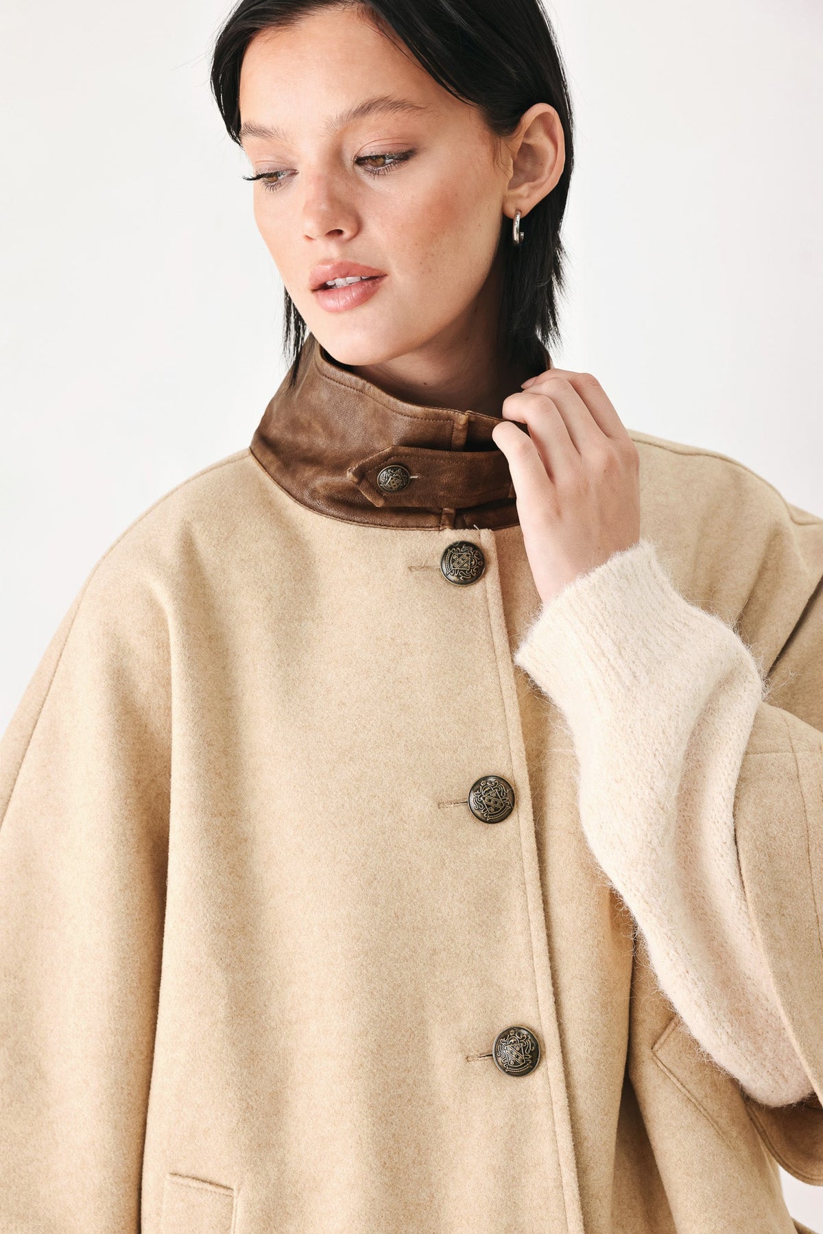 CITY IN MOTION BUCKLED CAPELET JACKET