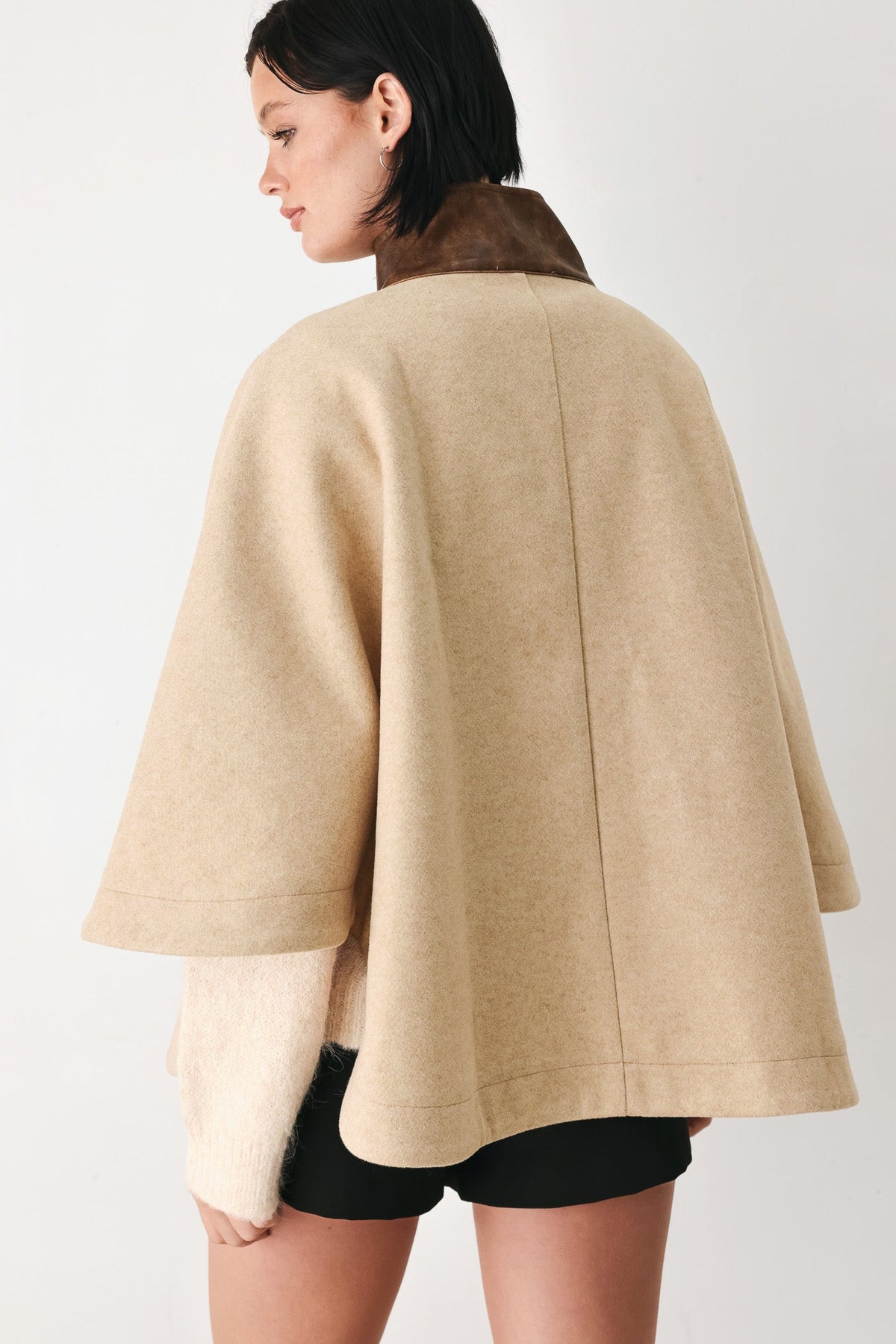 CITY IN MOTION BUCKLED CAPELET JACKET