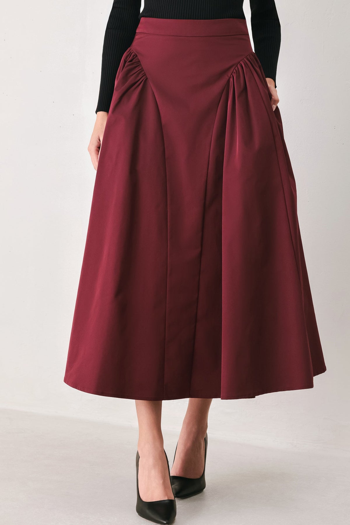 SCULPTED NOIR SHIRRED MIDI SKIRT