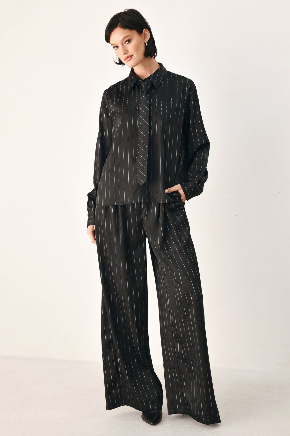 CITY AFTER DARK STRIPED WIDE LEG PANTS