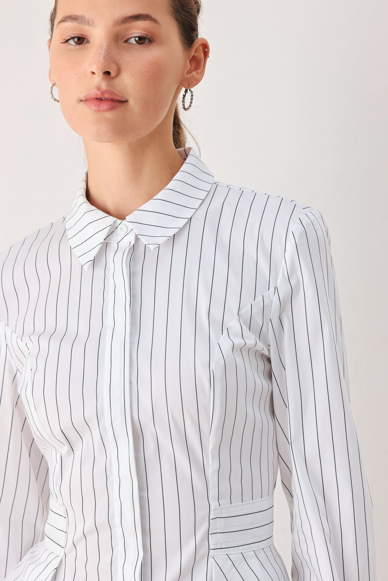 MODERNIST PINSTRIPE FLARED-WAIST WOVEN TOP