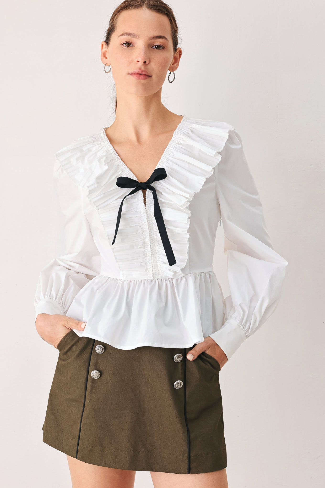AMELIE PLEATED RUFFLE V-NECK WOVEN TOP