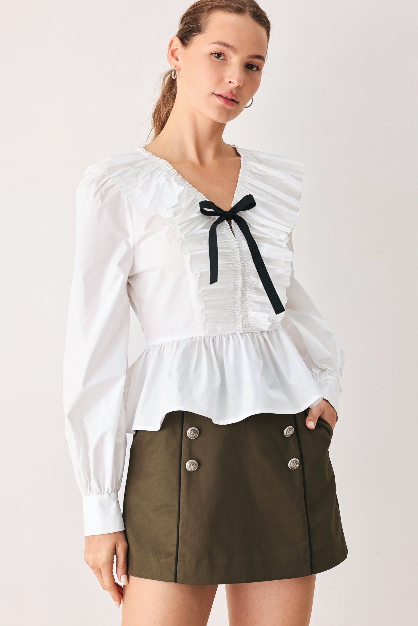 AMELIE PLEATED RUFFLE V-NECK WOVEN TOP