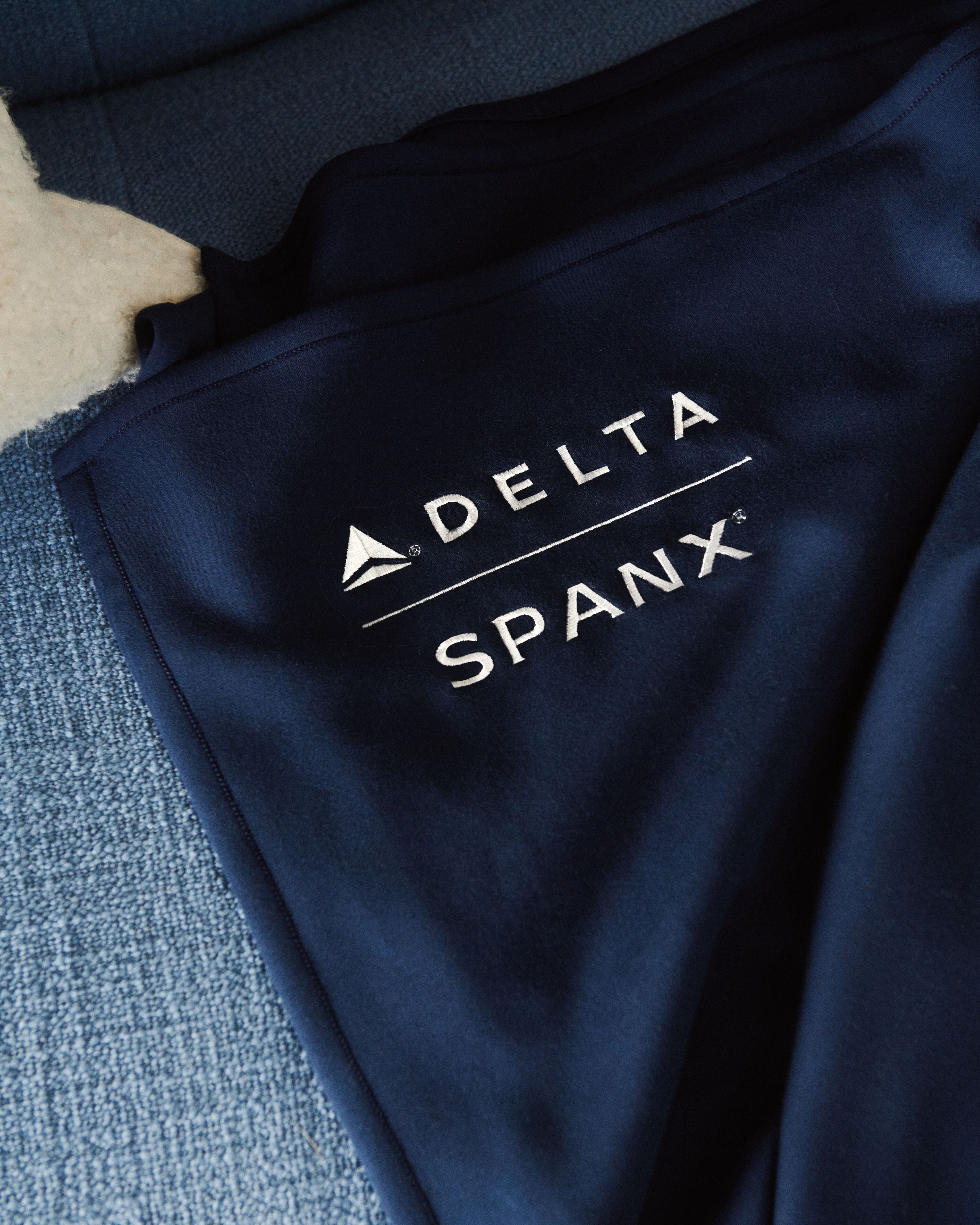 Delta x SPANX AirEssentials® Blanket