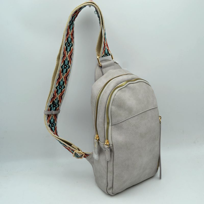 Multi-Zip Sling Backpack with Patterned Shoulder Strap