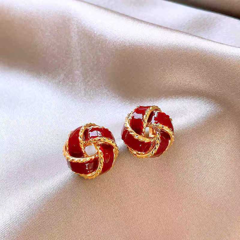 Women's Exquisite Contrast Color Truelove Knot Design High-grade Light Stud Earrings