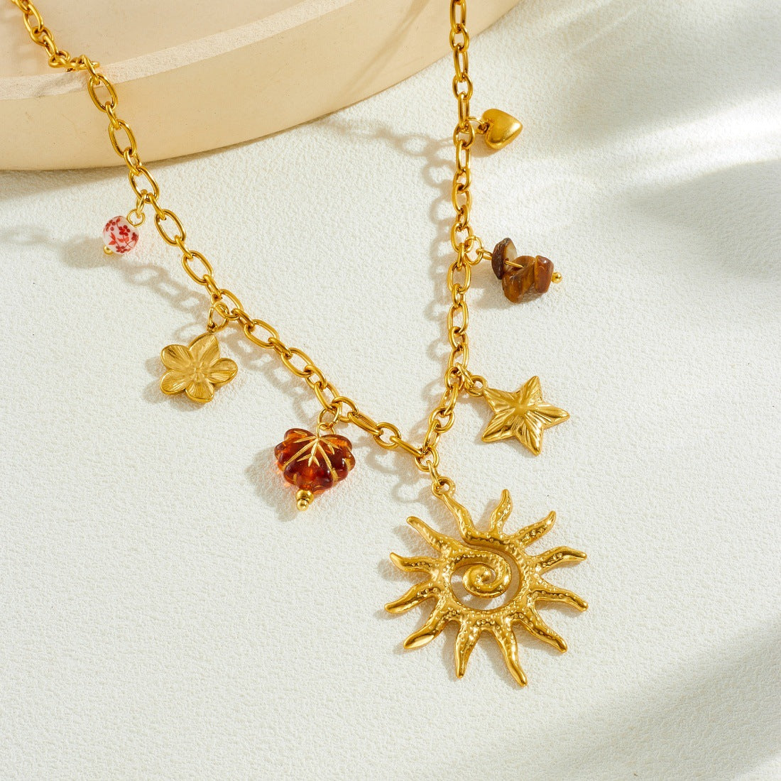 Fashion Gold-plated Star Sunflower Gravel Beaded Leaf Stainless Jewelry Set