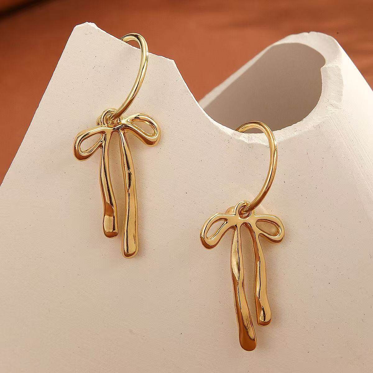 Women's Style Metal Bow Matte Gold Line Stud Earrings