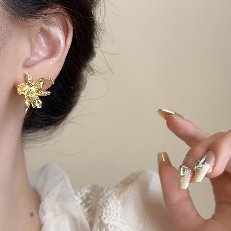 Women's Three-dimensional Flowers Retro High Sense Mosquito Coil Ear Clip