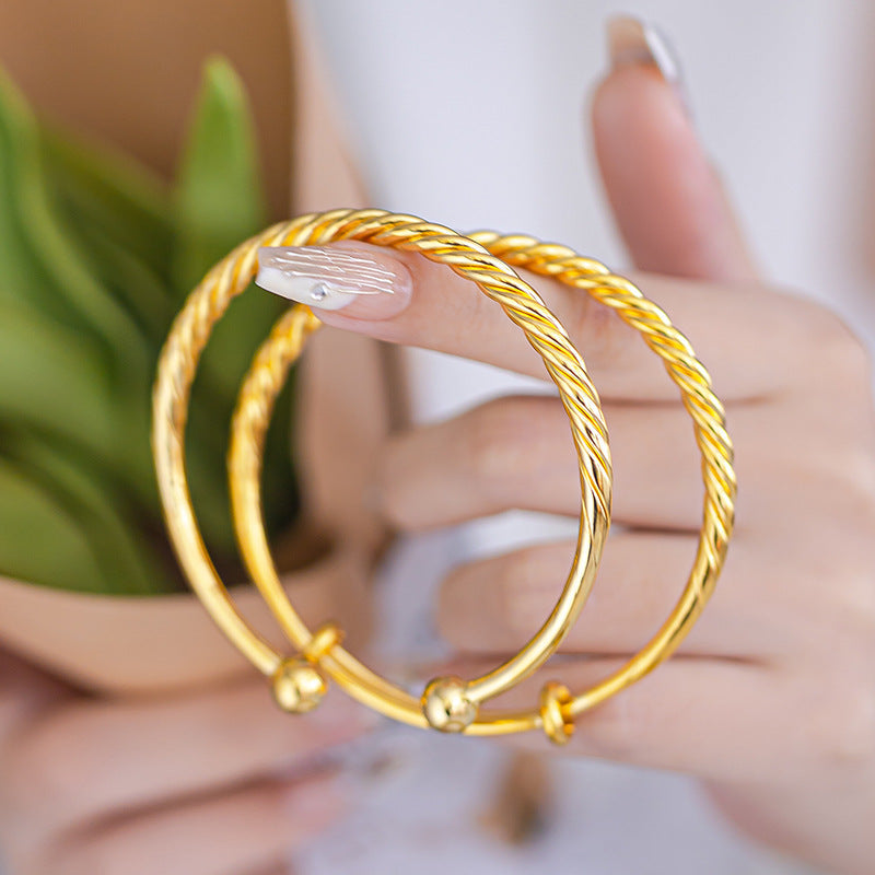 Polished Surface Twist Push-pull Alluvial Gold Bracelet