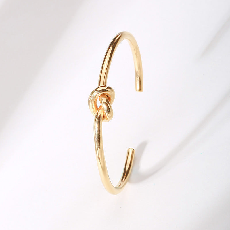 Women's Titanium Steel Knotted Gold Electroplated Fashion Bracelet