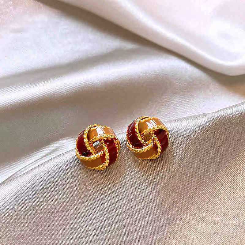 Women's Exquisite Contrast Color Truelove Knot Design High-grade Light Stud Earrings