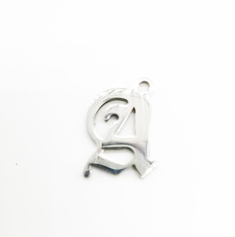 Titanium Steel Retro Alphabet Outer Hole Round Artistic Pendant
