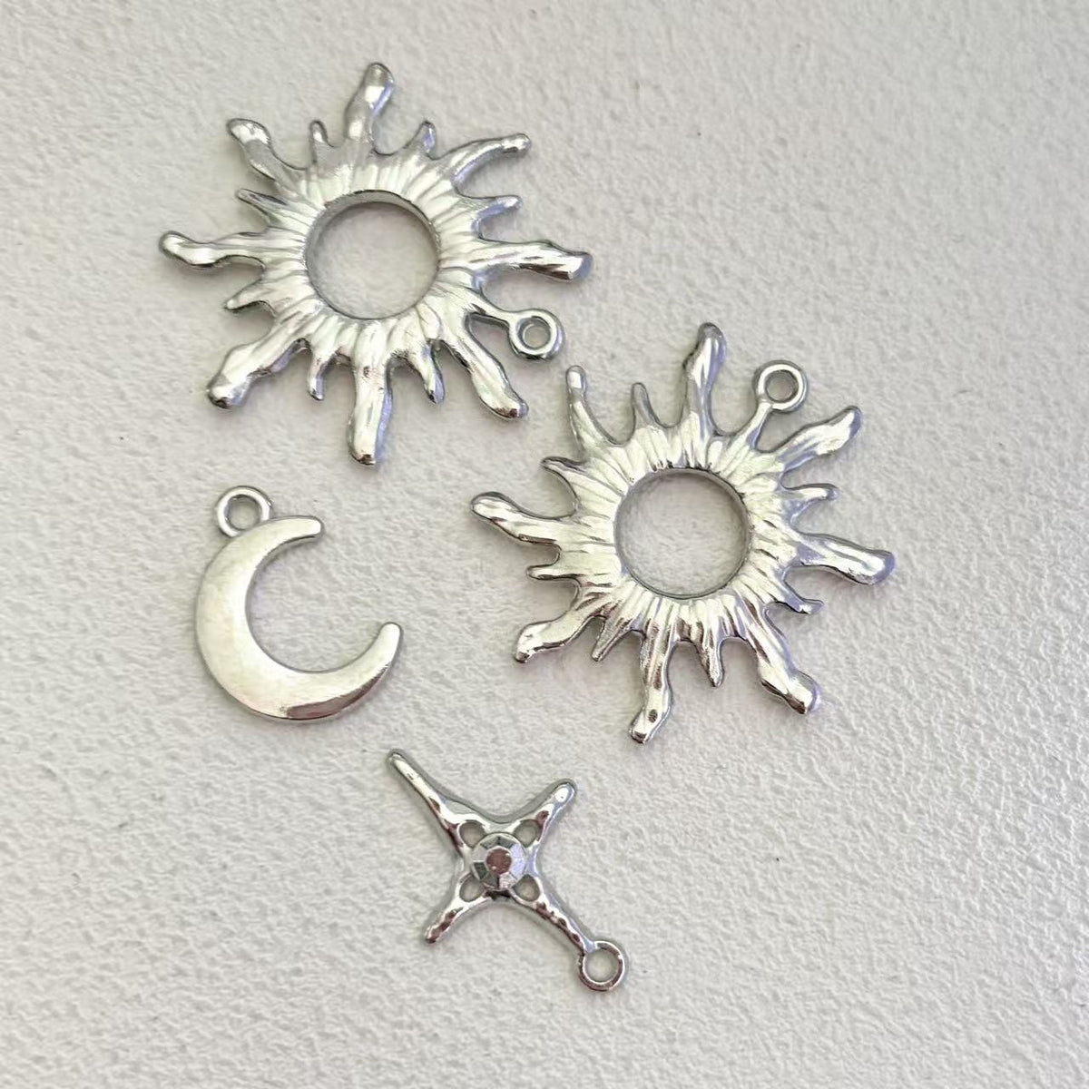 Hollow Sunflower Four Awn Star Moon Pendant
