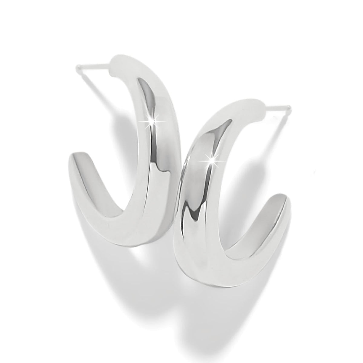 Brighton hoop earrings with thick polished silver-plated curved design and post backs on a white background