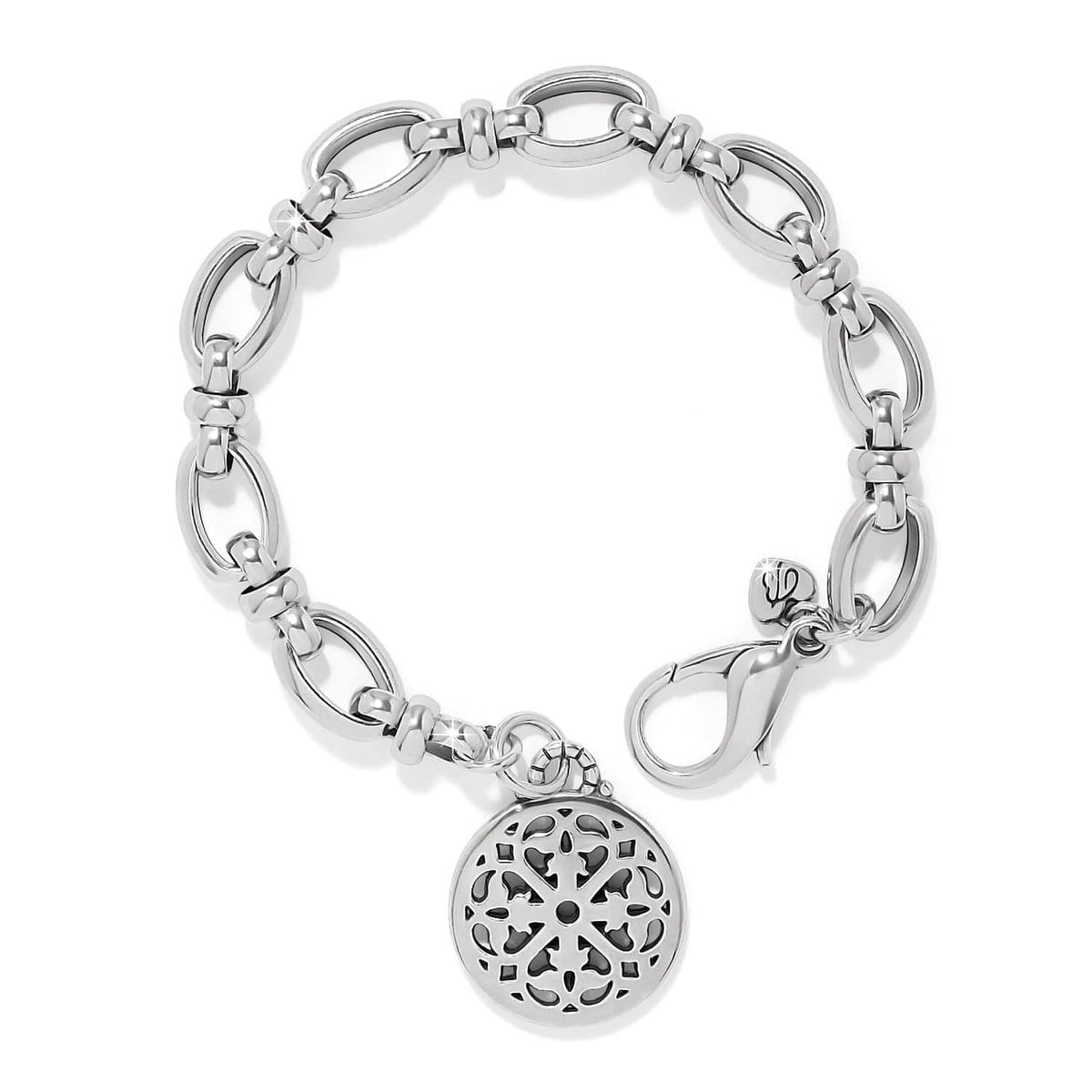Brighton charm bracelet with silver-plated oval link chain, lobster clasp, and round filigree medallion on a white background
