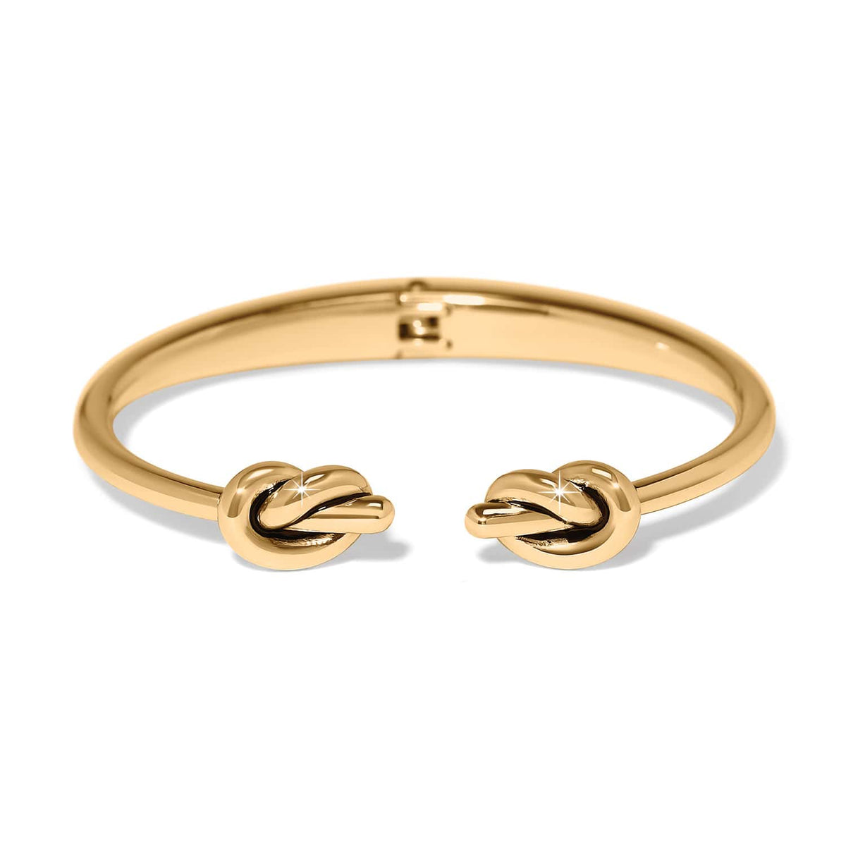 Brighton cuff bracelet with gold-plated finish and double knot end caps on a white background