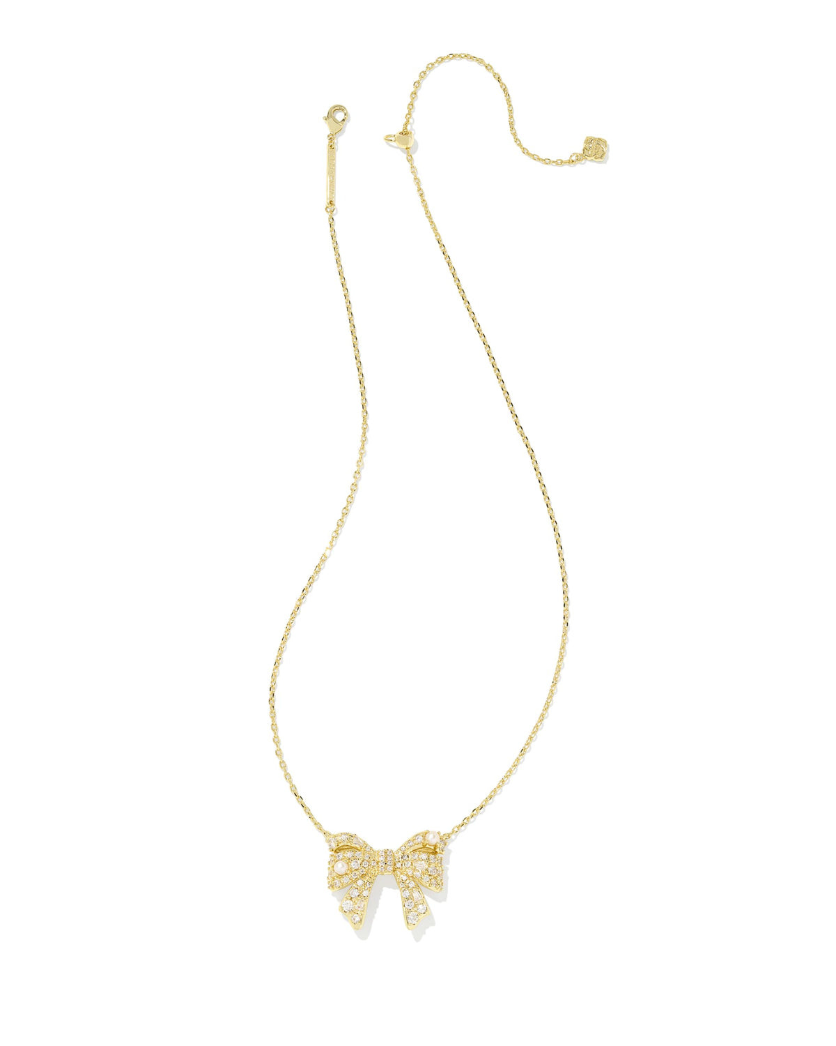 Kendra Scott Krista Bow Short Pendant Necklace in Gold White Mix on model