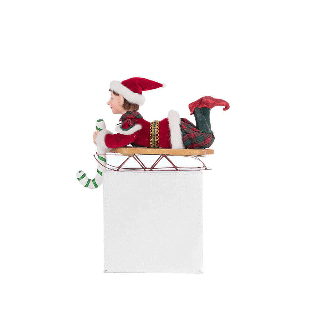 Laying Elf on Sled Stocking Holder by Katherine's Collection