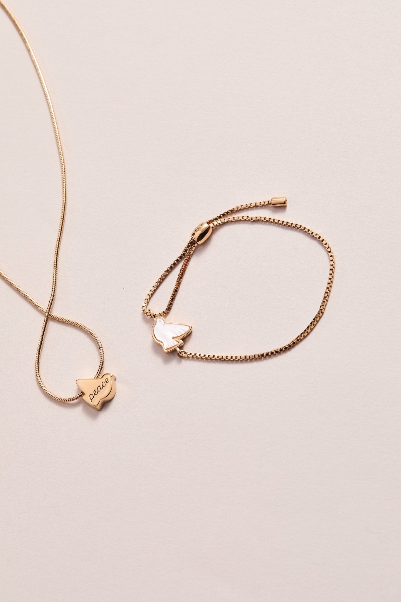 Pearlized Dove 'Peace' Slider Necklace by ALEX AND ANI at Shirley Shoppe
