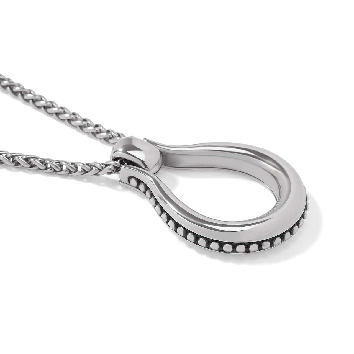 Close-up of Brighton horseshoe pendant necklace with silver-plated finish, beaded edge detail, and woven chain