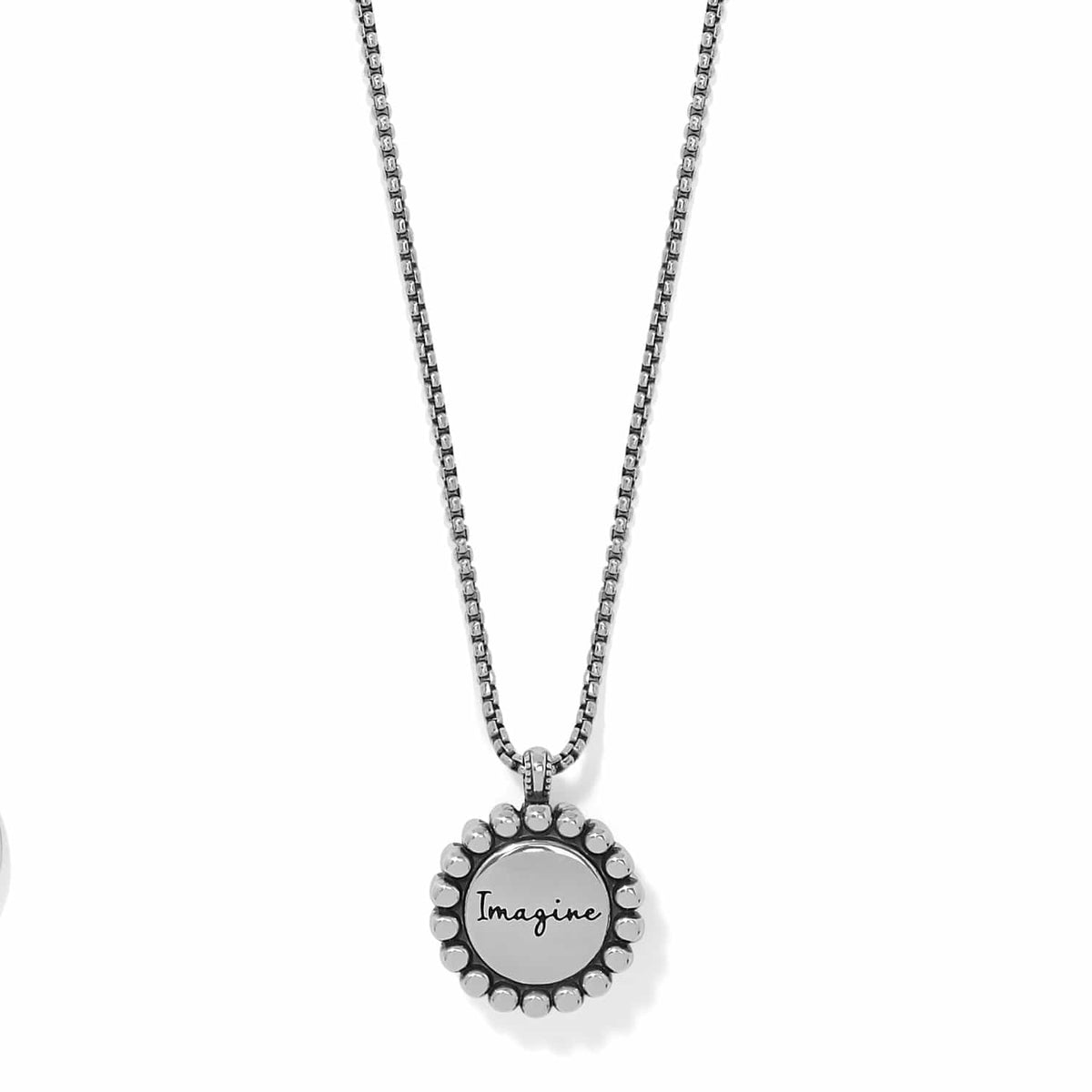 Brighton pendant necklace with silver-plated beaded circle charm engraved with Imagine on a white background
